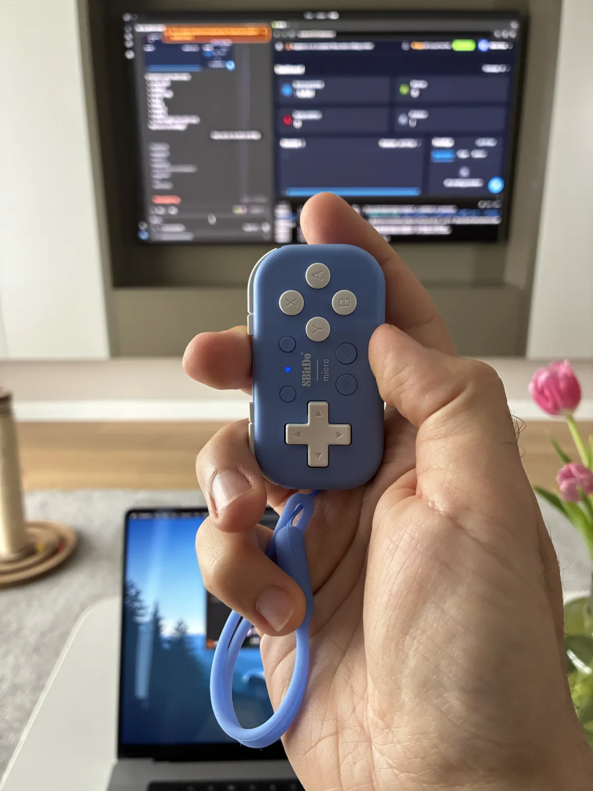 8BitDo Micro controller in my hand